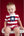 Model Posing in Front of Red Cloth Backdrop Fabric