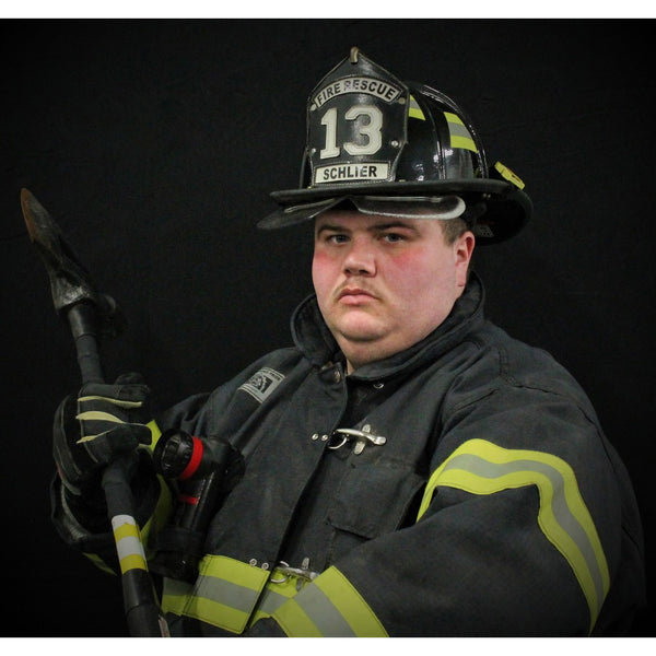 fireman studio portrait solid black background