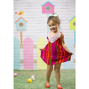 Spring Fence Backdrop White brick wall with Little girl Twirling in Portrait