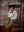 Brick Floordrop being used as a backdrop with boy model posing in chair