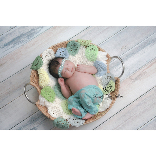 Pastel Colored Wood Plank Backdrop for photography with baby laying in basket