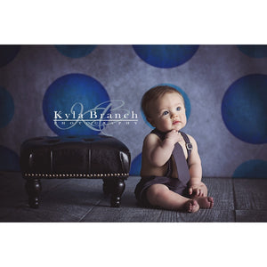 Child portrait on blue dot backdrop