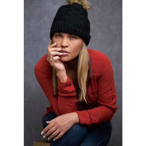 model posing in front of gray old master canvas backdrop